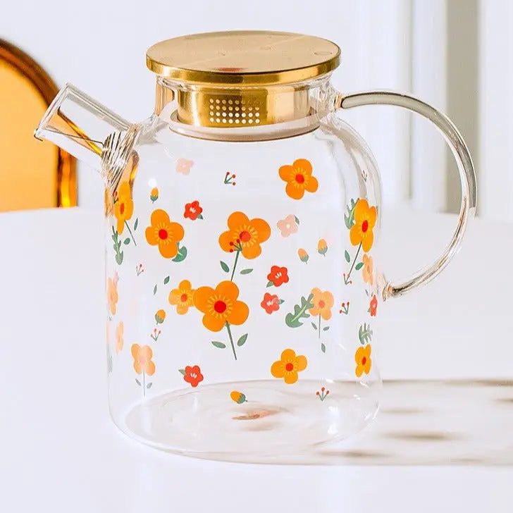 théière et tasse en verre avec fleur de thé en fleurs à l'intérieur 8585728  Photo de stock chez Vecteezy